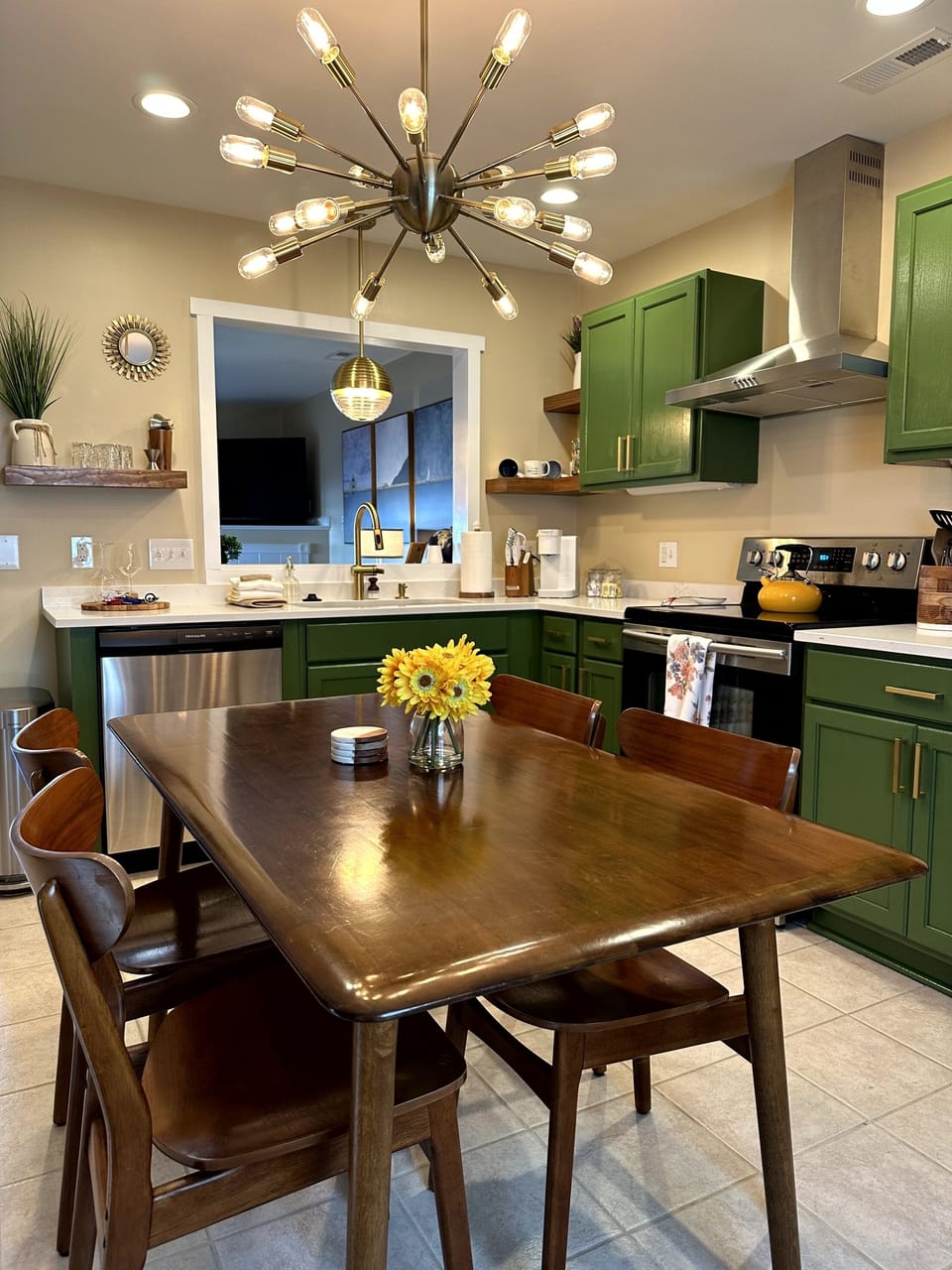 Dine-in Kitchen with look-through, stainless appliances, coffee station.