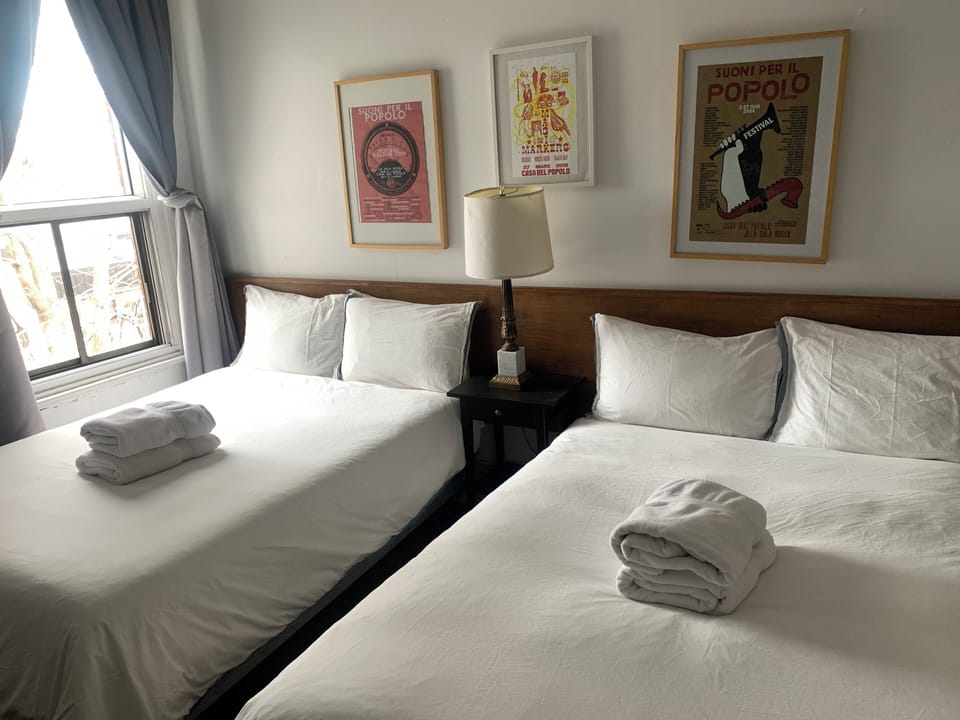Economy Double or Twin Room, 2 Queen Beds, Non Smoking, Shared Bathroom | Individually decorated, individually furnished, blackout drapes
