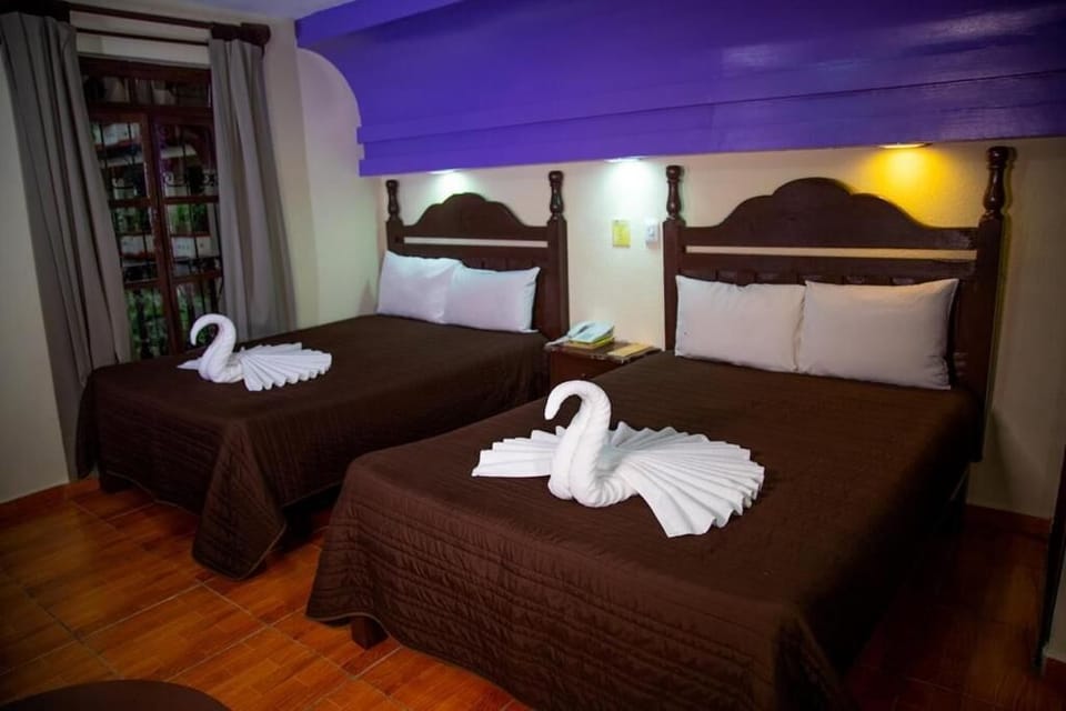 Premium bedding, down comforters, desk, laptop workspace