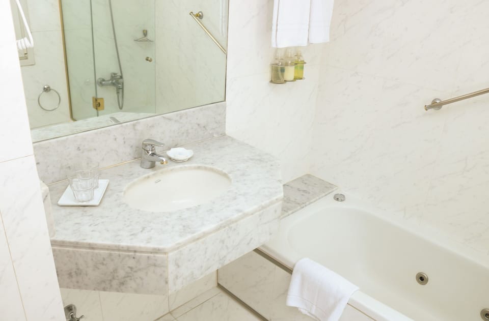 Executive Double Room | Bathroom | Combined shower/tub, deep soaking tub, rainfall showerhead