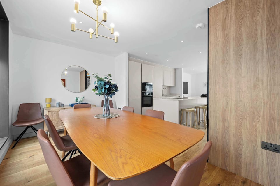Open-plan dining and kitchen space with room for the whole group to gather