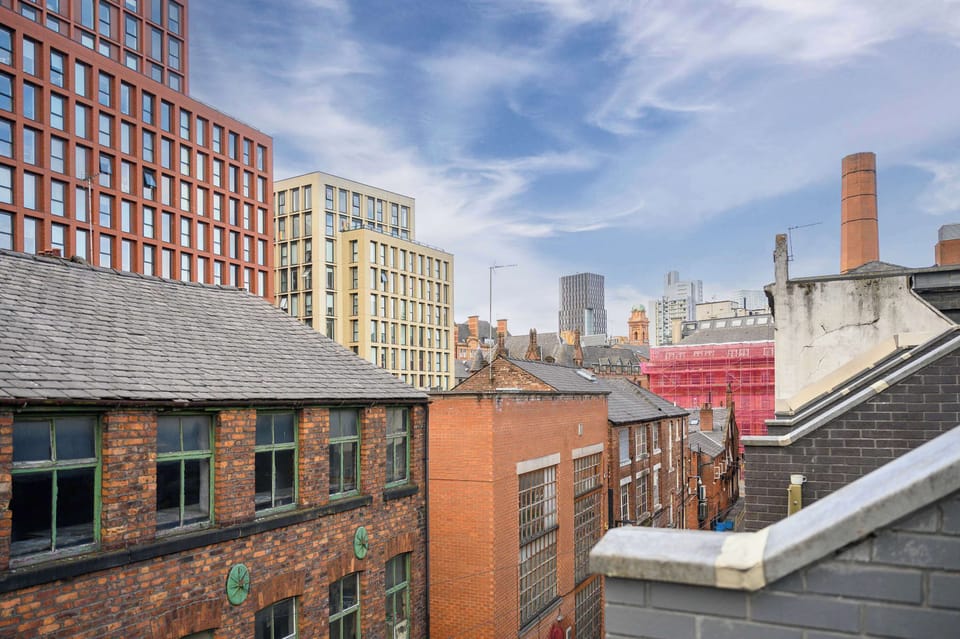 Panoramic views across the Manchester skyline from the rooftop terrace