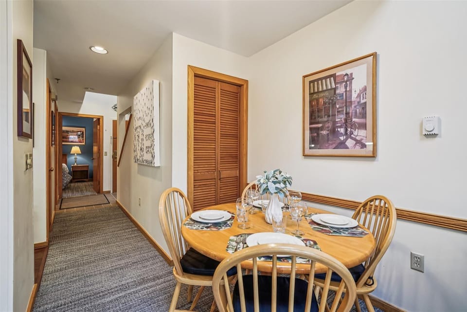 A cheerful dining space perfect for morning coffee, card games, or sharing stories from the day's adventures.