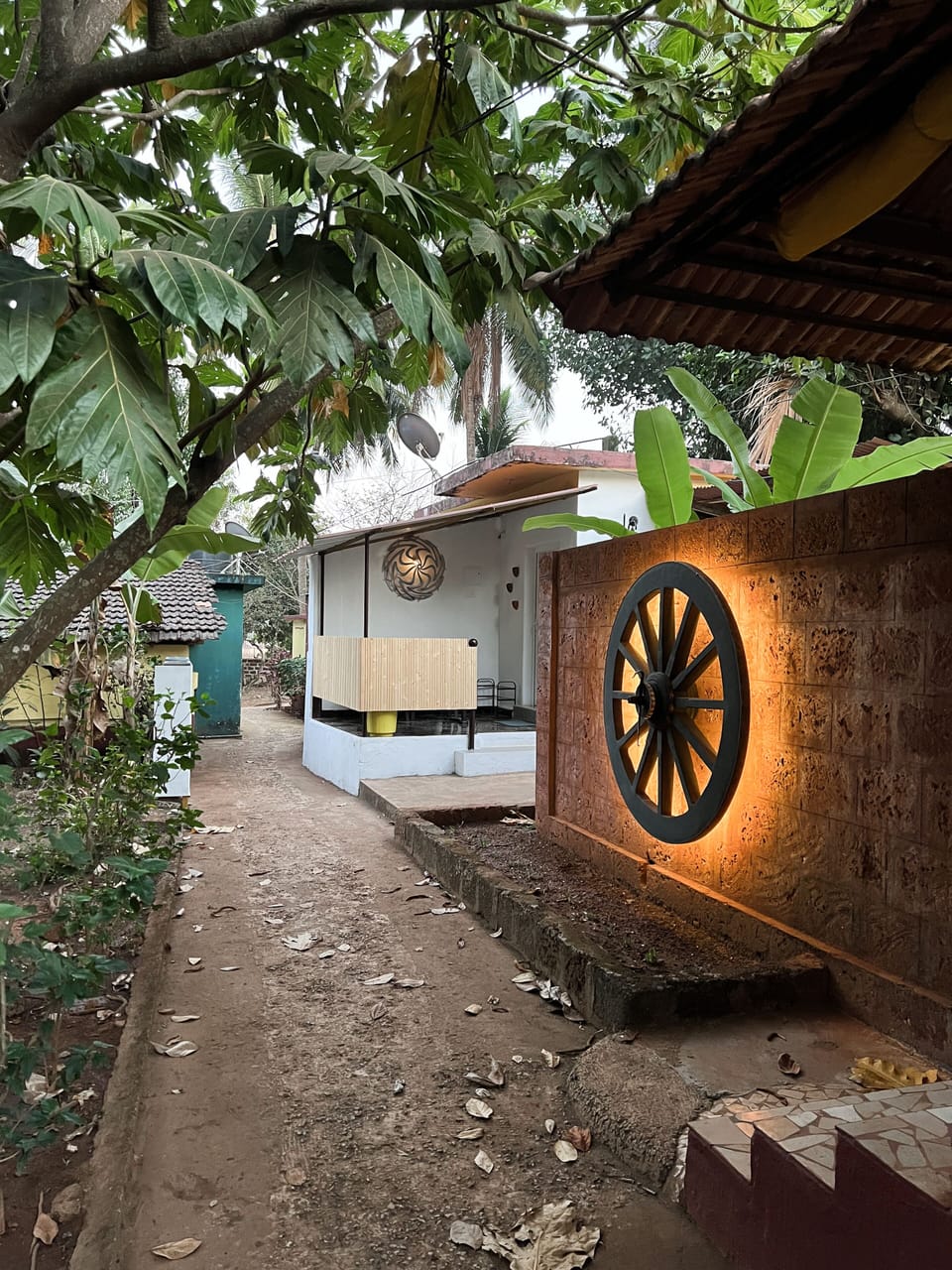 way to your room and garden area with tropical trees and light at night