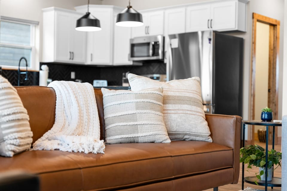 The luxurious, commercial-grade leather furniture showcases comfort and style. Perfect for families of all ages to enjoy during their vacation rental