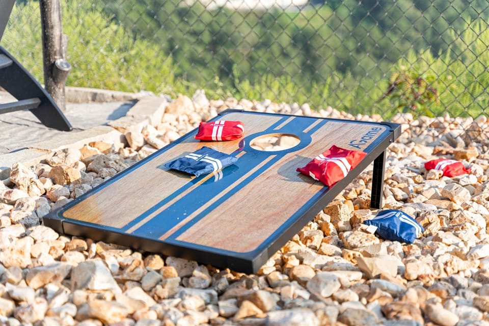 In your cabin, you can find a variety of activities to enjoy without leaving. These include classic games like Corn Hole, outdoor Jenga, life-size Connect Four, outdoor ping pong, and much more!