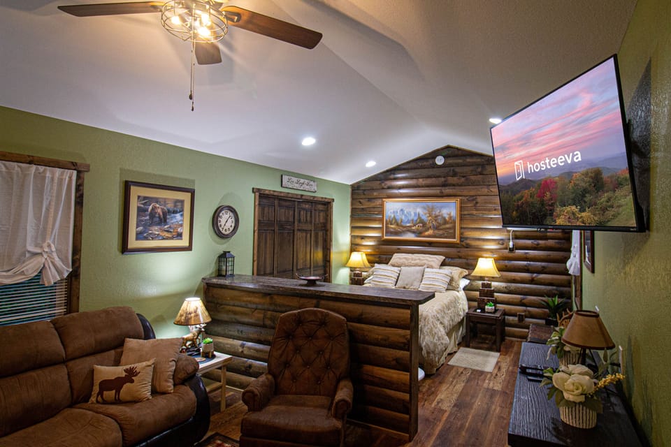 Comfort Cabin, Fireplace, Mountain View | Living room | 60-inch flat-screen TV with satellite channels, fireplace