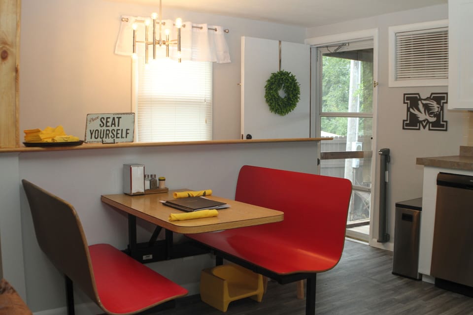 Kitchen, booth seating/dining