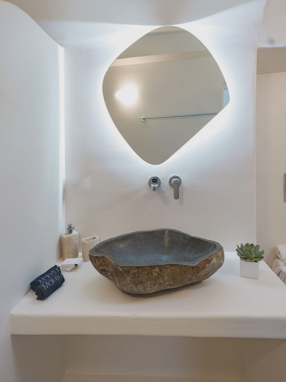 Deluxe Suite with Indoor Hot Tub and Caldera View | Bathroom | Slippers