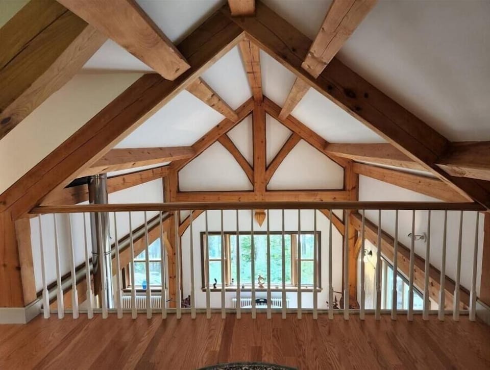 View from loft to Great Room with King Post truss.