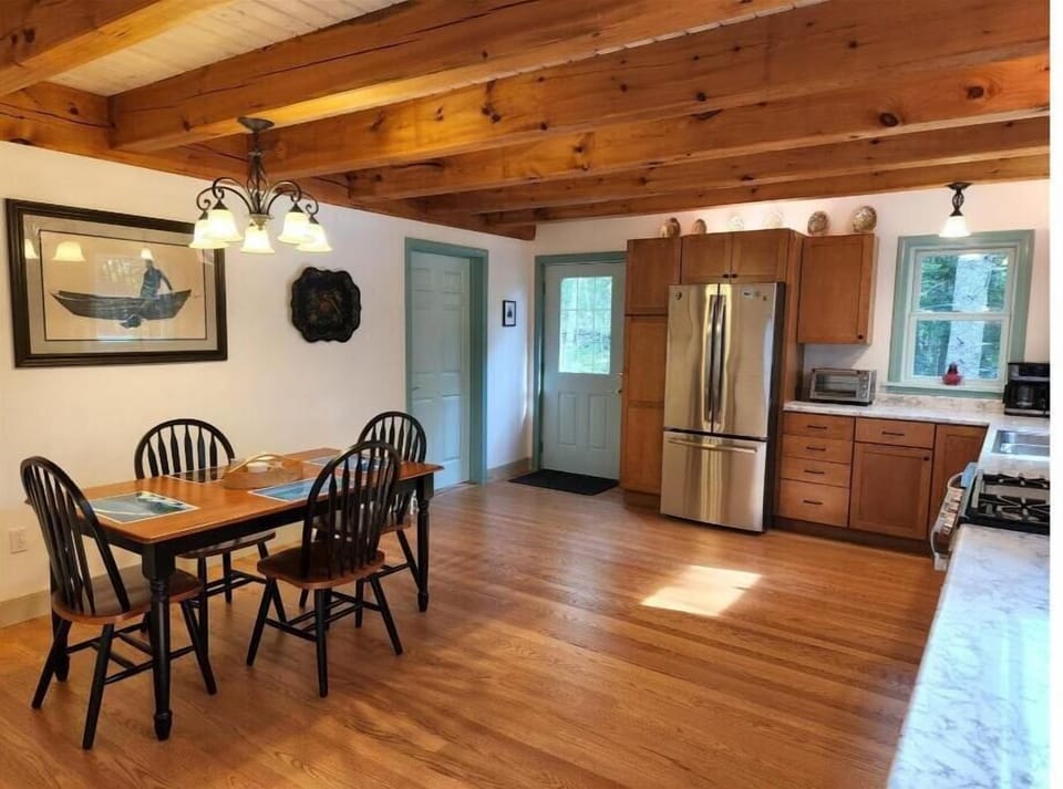 Kitchen, dining to seat 6 (bench in Great Room). Bathroom to left and side deck 