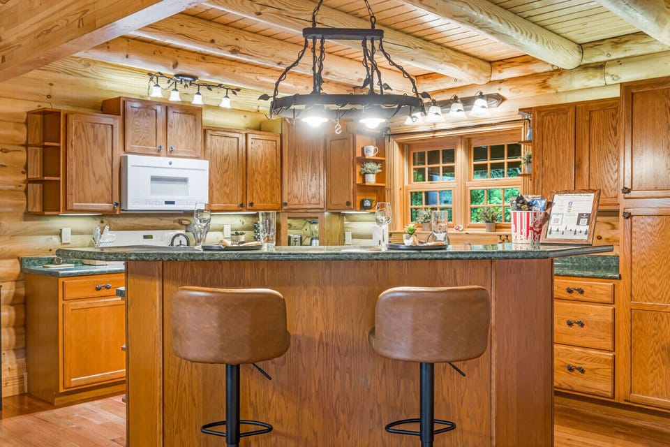 Take a seat at the kitchen island while you watch the chef of the group prepare a fantastic meal!