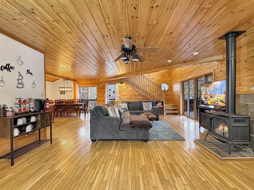 Living Room: Bright wood accents & spacious layout invite relaxation and fun gatherings!