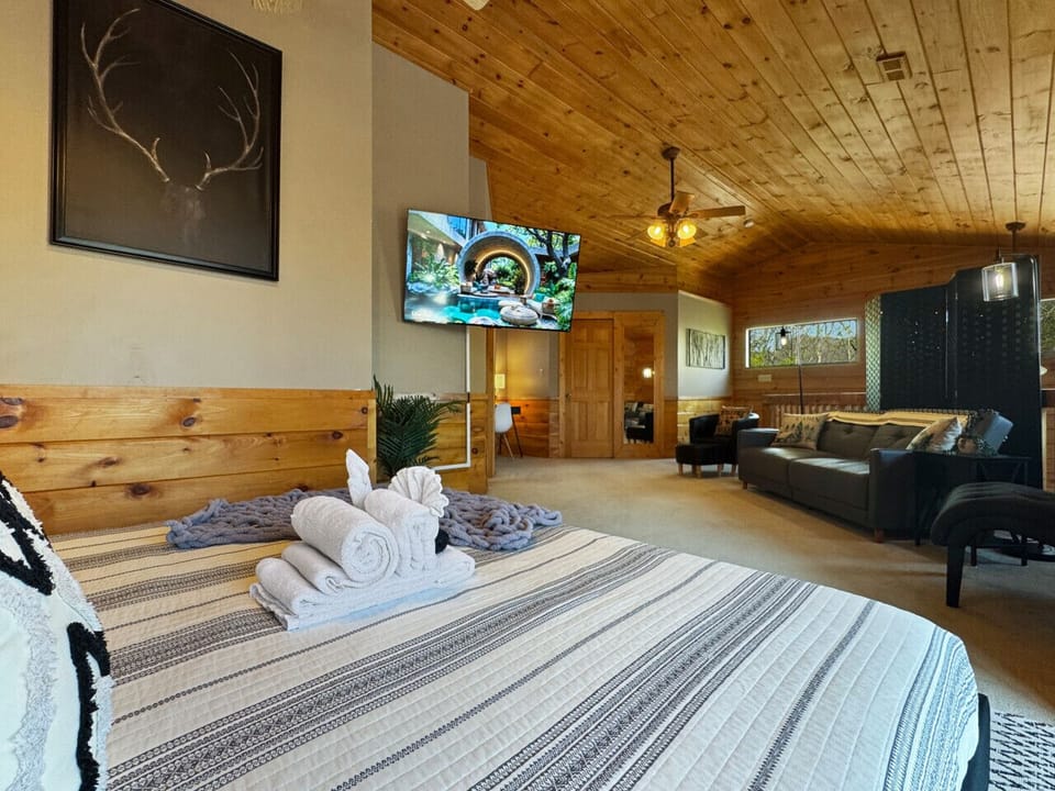 King Bedroom Suite: Enjoy modern comforts with rustic elegance and stunning mountain views!