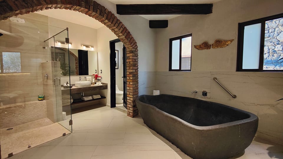 Design Studio Suite, 1 King Bed, Balcony, Resort View | Bathroom | Hair dryer, soap, shampoo, toilet paper