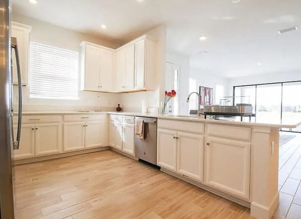Kitchen, quartz and stainless steel appliances