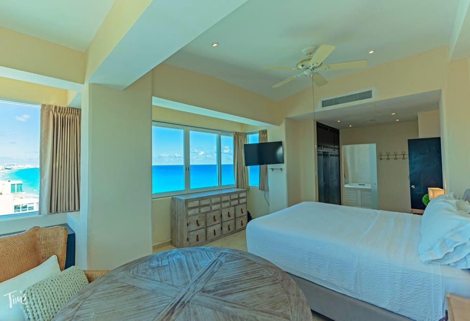 Penthouse 1 of 3:  Master Bedroom with King Bed &amp; Ocean View. All of Our Beds Come with Quality Linens (575 Thread Count), Pillows, and a Soft Comforter.