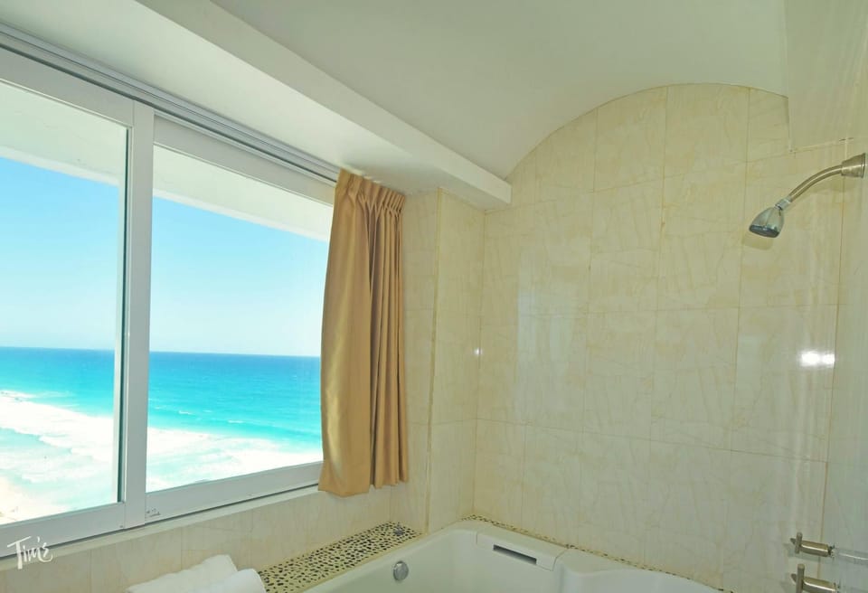 Penthouse 1 of 3: Master Bathroom Shower.  We provide Large &amp; Soft 100% Cotton Towels in Every Bathroom with a Shower.  We also Provide 8 Large Beach Towels for the unit.