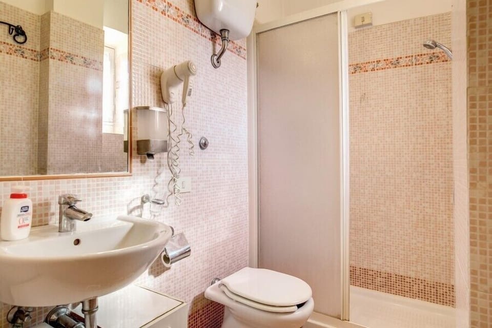 Double or Twin Room | Bathroom | Shower, free toiletries, hair dryer, slippers
