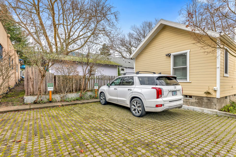1 off street parking spot available. The second spot is reserved for front house guests.
