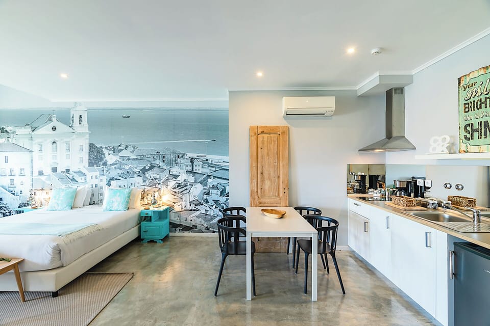 Family Suite, River View | Private kitchen | Full-size fridge, microwave, stovetop, coffee/tea maker