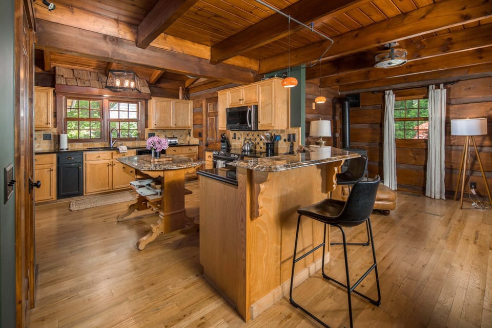 Spacious kitchen with granite countertops and ample prep space