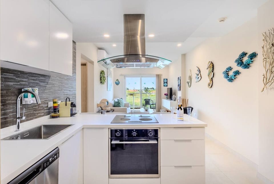 The kitchen is fully furnished with state-of-the-art cooking utensils, making it perfect for cooking any meal, from a quick breakfast to a three-course gourmet dinner.