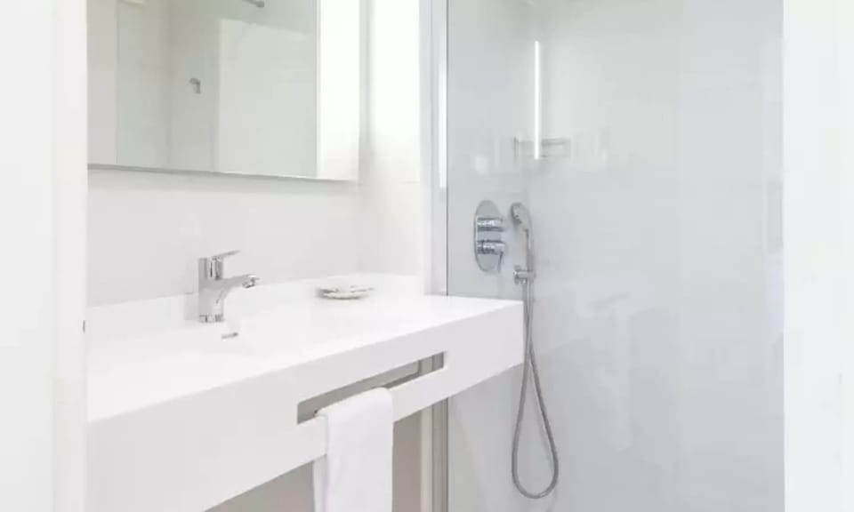 Apartment, 1 Bedroom, Balcony | 1 bedroom, desk, blackout drapes, iron/ironing board