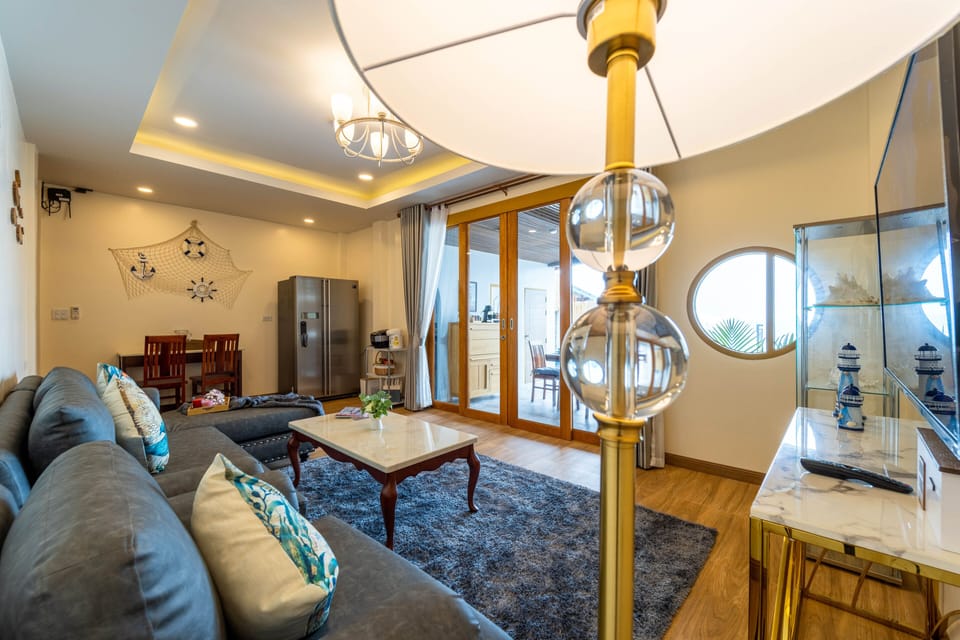 Panoramic Villa | Living area | Flat-screen TV