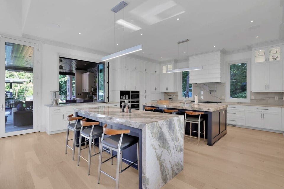 Elevate your culinary experience with a spacious double kitchen island.