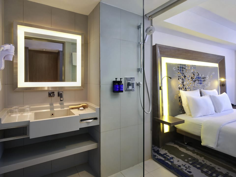 Rainfall showerhead, eco-friendly toiletries, hair dryer, slippers