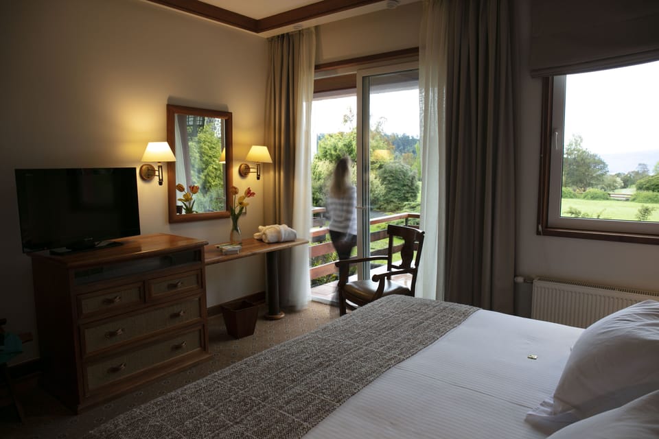 Premium bedding, down comforters, pillowtop beds, minibar
