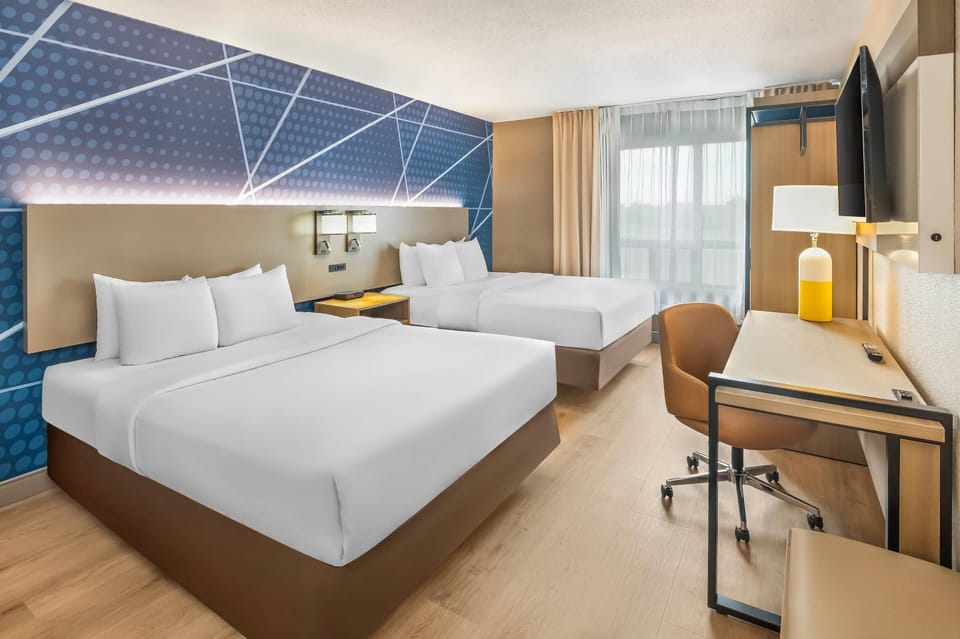 Room, 2 Queen Beds, Non Smoking | Desk, blackout drapes, iron/ironing board, free cribs/infant beds