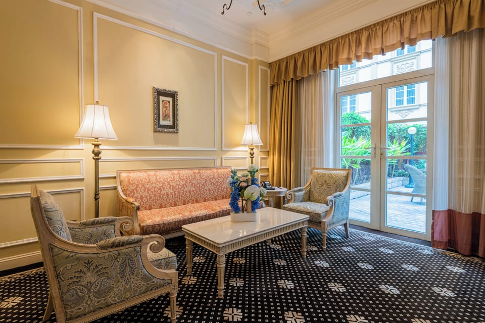 Deluxe Suite, Garden View | Minibar, in-room safe, desk, laptop workspace