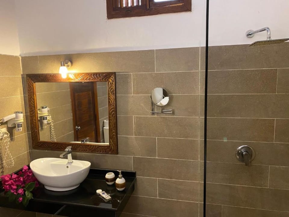 Quadruple Room, Ocean View | Bathroom | Shower, free toiletries, hair dryer, towels
