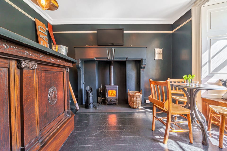 Josiah Brown's pub warmed by a log burner.
