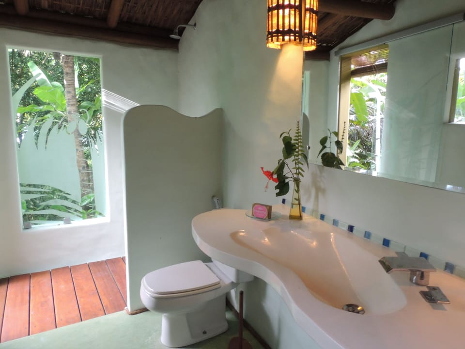 Premium Suite | Bathroom | Shower, hair dryer (on request), towels
