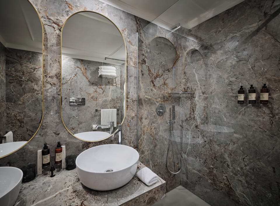 Superior Double Room, Sea View | Bathroom | Designer toiletries, hair dryer, bathrobes, slippers