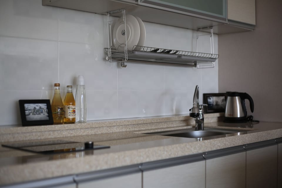 Family Room, City View | Private kitchen | Fridge, microwave, electric kettle