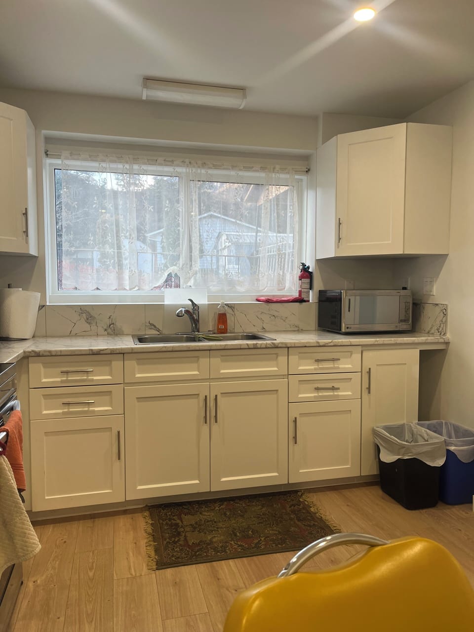 South side sink and cabinets faces south