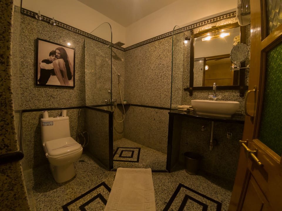 Shower, free toiletries, hair dryer, slippers