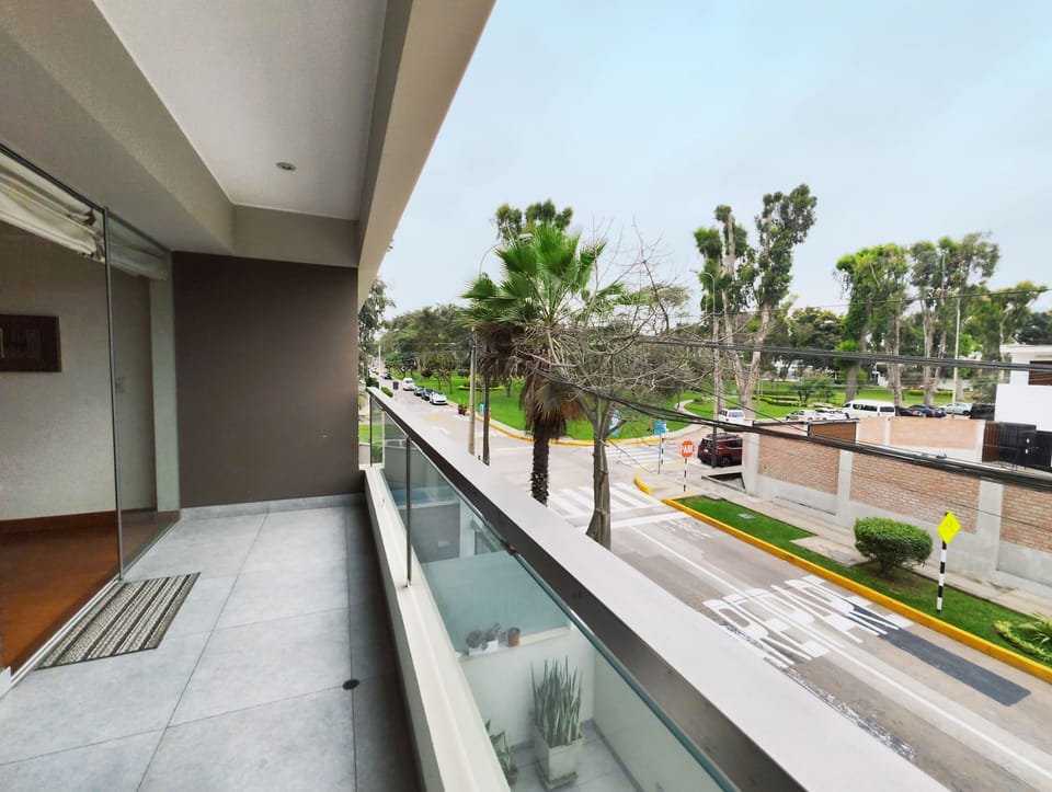 Spacious balcony with park view