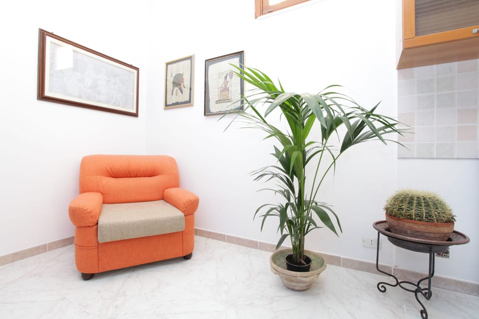 Family Room, 2 Bedrooms, City View | Living room | Flat-screen TV