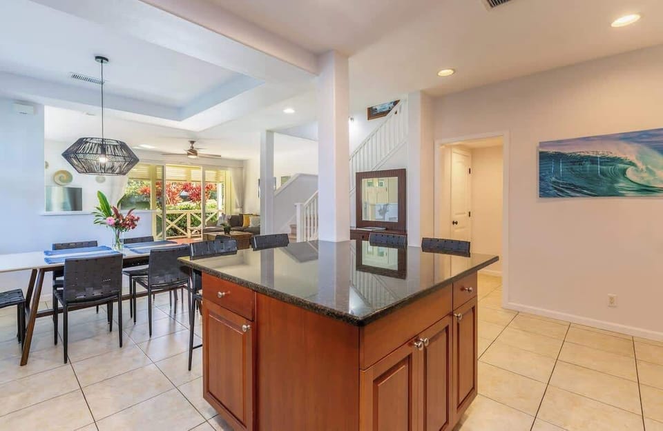 Enhance culinary experiences with a beautiful island in the kitchen, providing additional work space and a stylish focal point