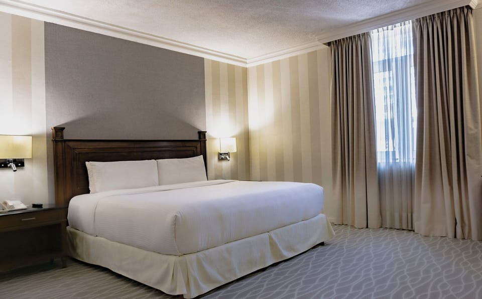 Premium bedding, in-room safe, desk, soundproofing