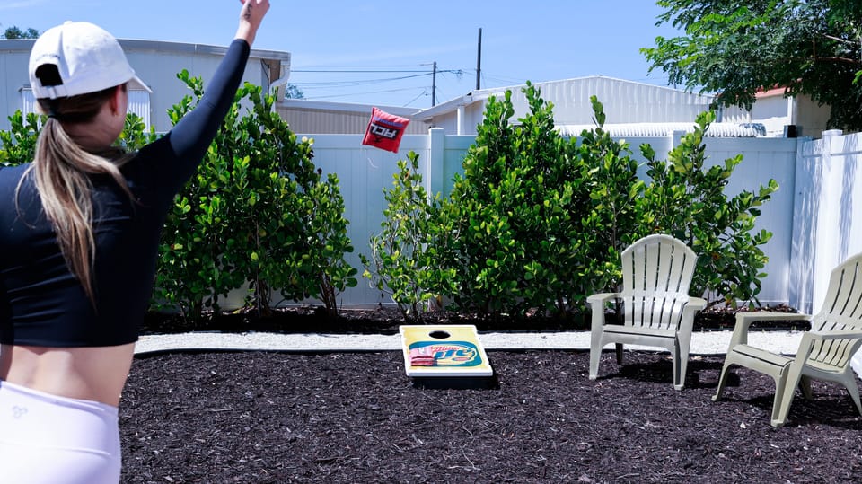 Patio game area with Corn Hole game