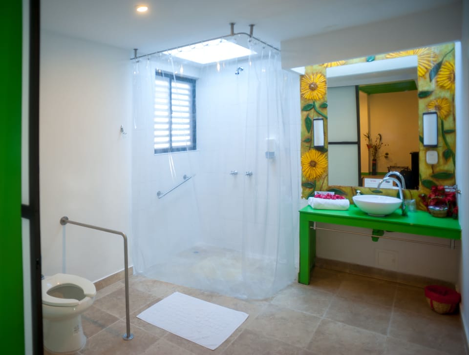 Quadruple Room | Bathroom | Hair dryer, towels