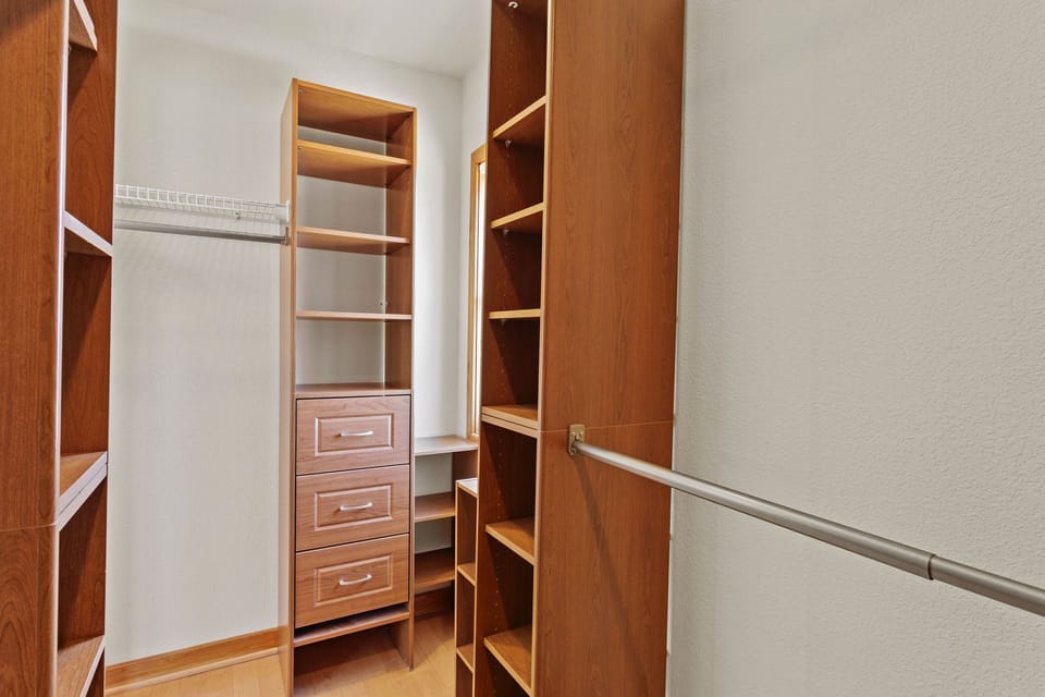 The Top-Level Master Bedroom boasts a walk-in closet.