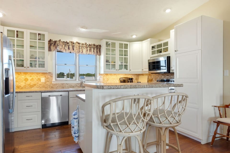 Whip up something delicious in the large Kitchen with updated appliances and plenty of prep space.