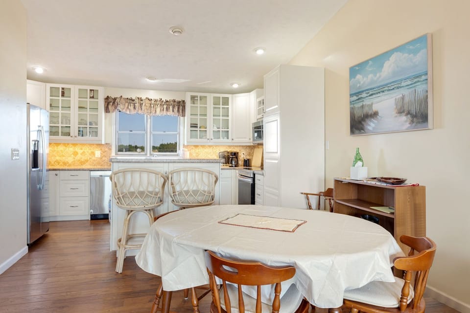 Whip up something delicious in the large Kitchen with updated appliances and plenty of prep space to enjoy in the Dining Area as you bask in the warmth of the Outer Banks sunshine.